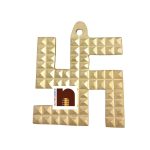swastik in brass wall hanging 1