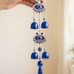 Evil Eye Wind Chime for Positive Energy for Home and Balcony Decor with Melody Sound (5 Bells) (42 Cms) (1 Pc)